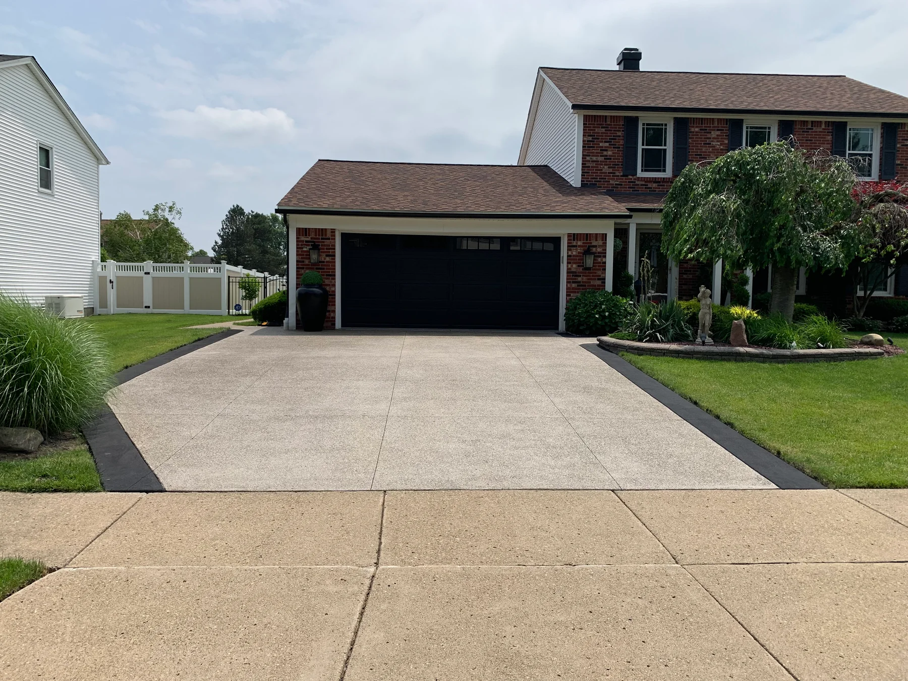 Finished concrete driveway installation and repair work near Buffalo NY