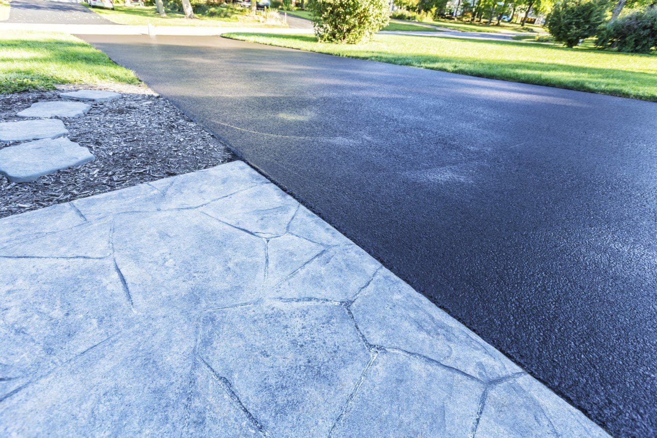 Close up of a sidewalk and driveway surface